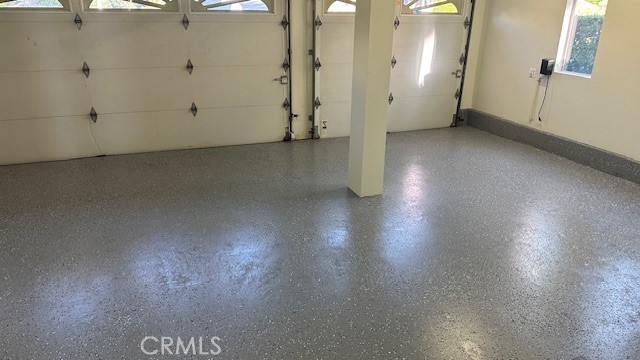19900 Mariposa Creek Way Porter Ranch, CA 91326 - Photo 34 of 37 an empty room with wooden floor and windows