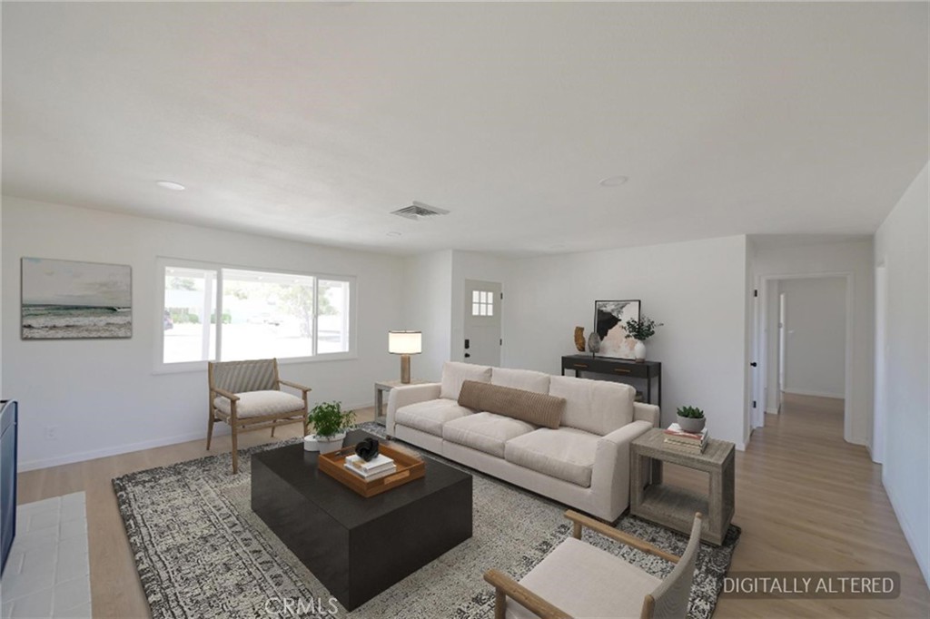 18190 Hiawatha Road Apple Valley, CA 92307 - Photo 4 of 28 Living Room (Disclaimer: Some images have been digitally enhanced with virtual staging to illustrate potential room layouts and furnishings. Actual property condition and features may vary. Buyer to verify all information independently).