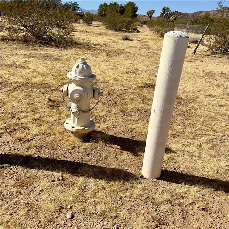 59787 Sharp Terrace Drive Yucca Valley, CA 92284 - Photo 19 of 19 a view of a floor to ceiling window with wooden floor