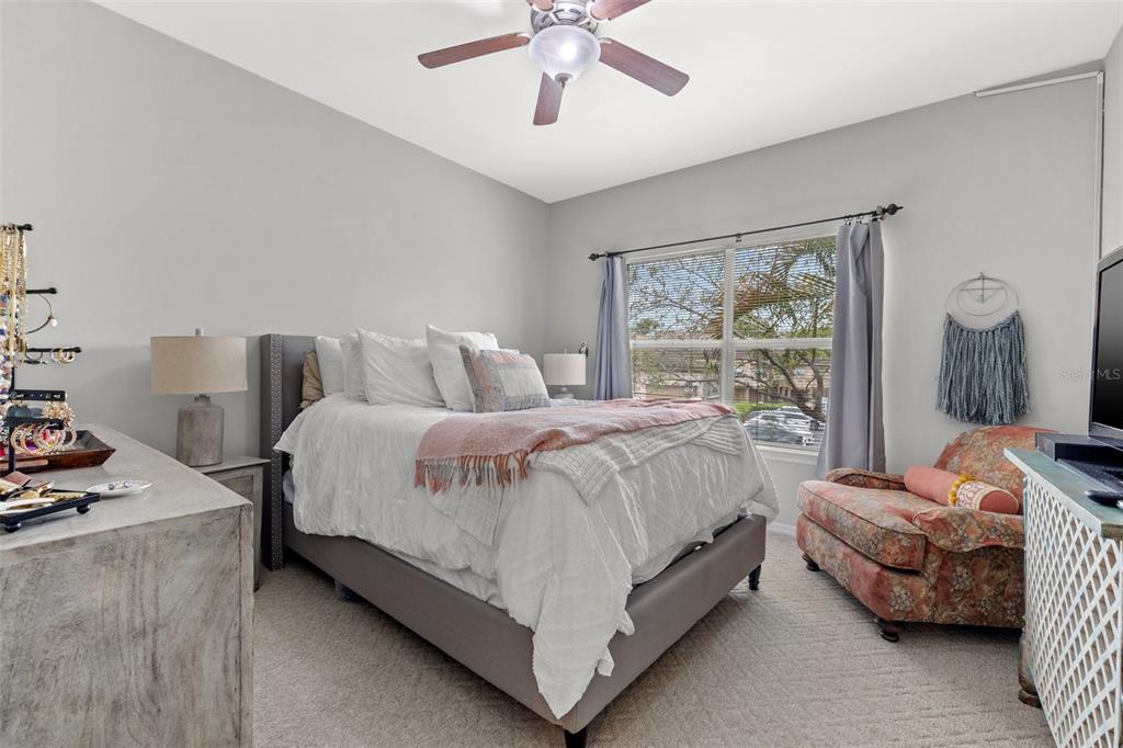 1039 Normandy Trace Road, Unit 1039 Tampa, FL 33602 - Photo 16 of 19 a bedroom with a bed and window