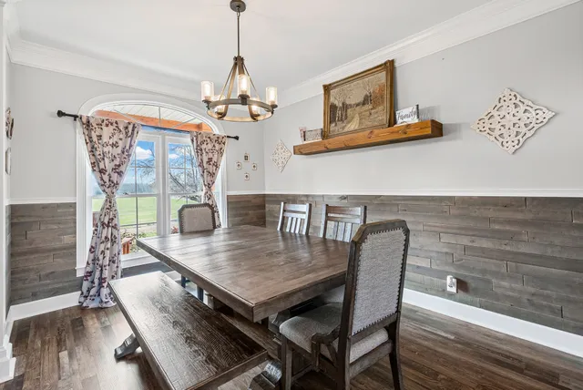 a bathroom with a sink a toilet and shower curtain