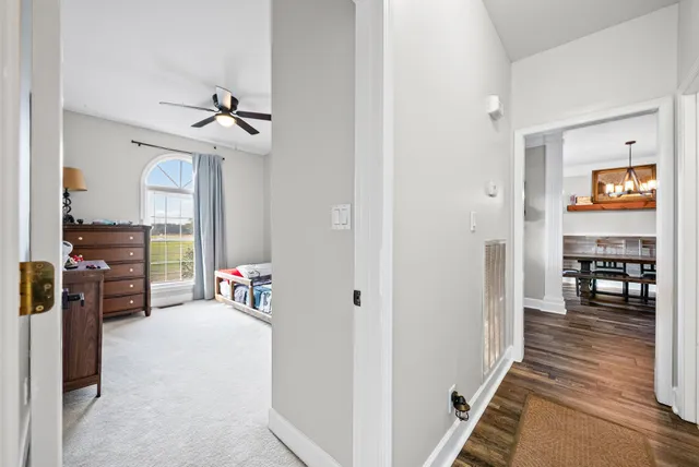 a bathroom with a sink toilet and a mirror
