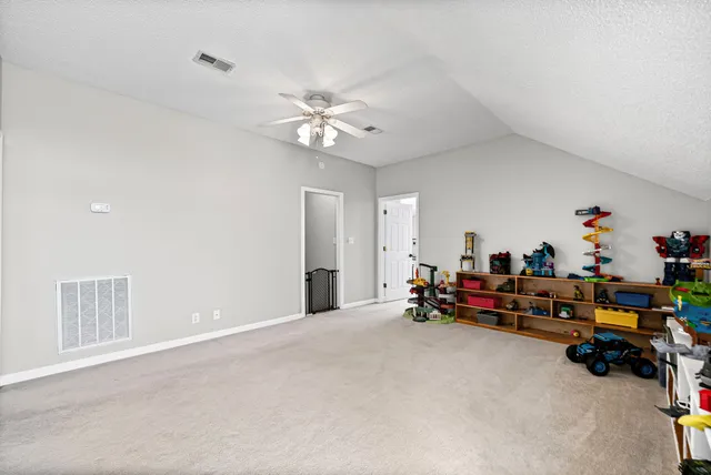 a view of a garden with a apartment