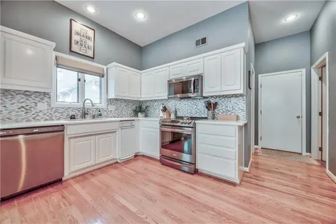 $695,000 | 7615 Eicher Drive, Shawnee, KS 66217