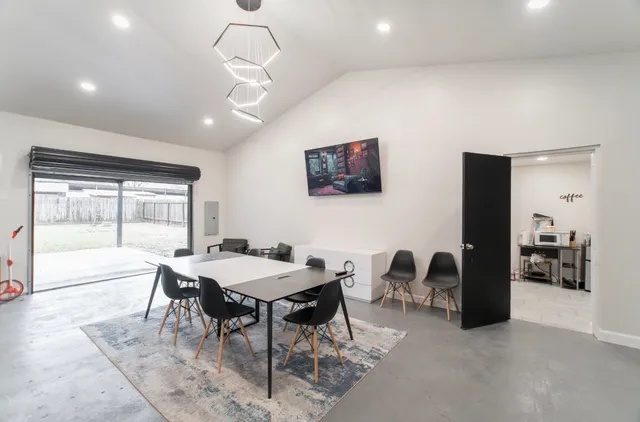 a view of a dining room with furniture