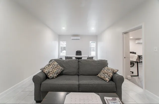 a living room with furniture and a couch