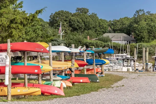 a view of swimming pool with seating area