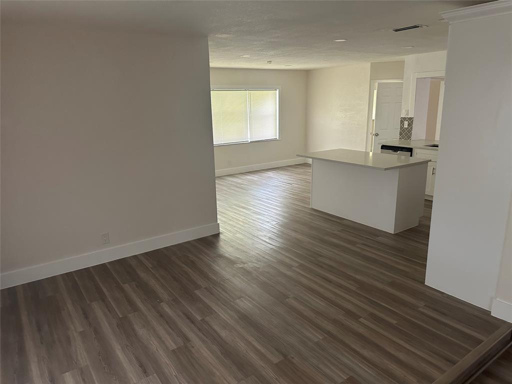 Margate Margate, FL 33068 - Photo 6 of 14 wooden floor in an empty room with a window