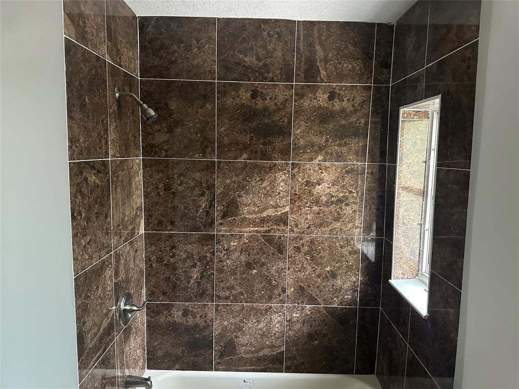 Margate Margate, FL 33068 - Photo 10 of 14 a bathroom with a shower