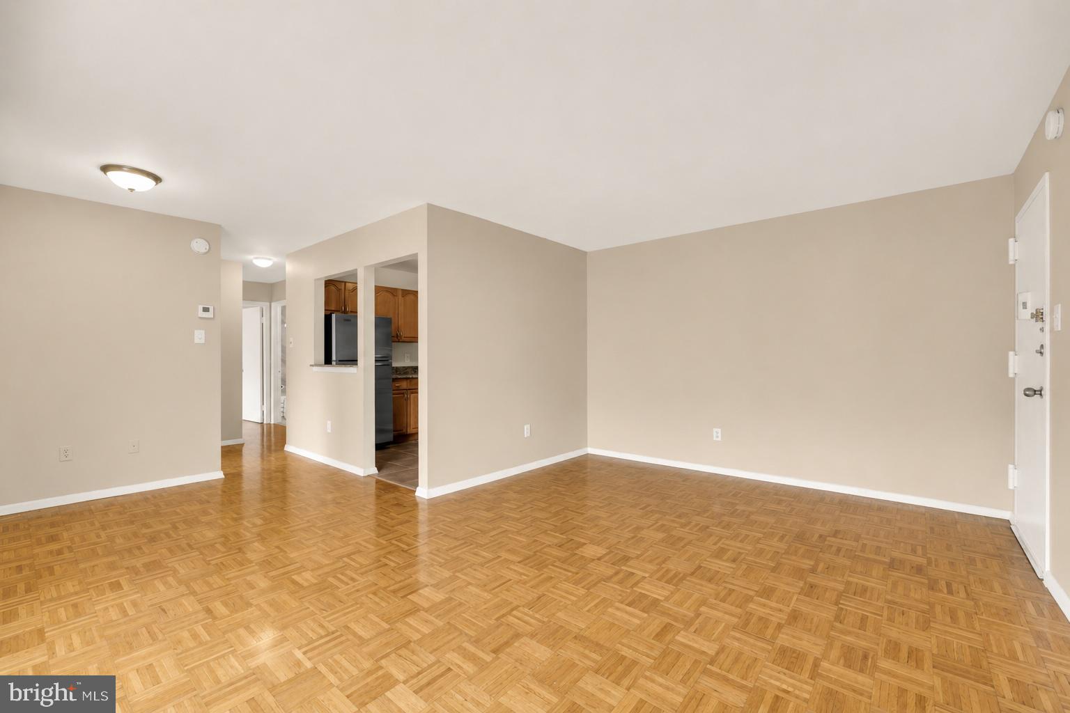7056 Eastern Avenue Northwest, Unit 107 Washington, DC 20012 - Photo 9 of 36 Large living room area!