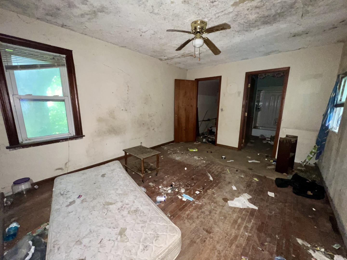 103 2nd Street Broadlands, IL 61816 - Photo 21 of 37 a bedroom with a bed and a mirror