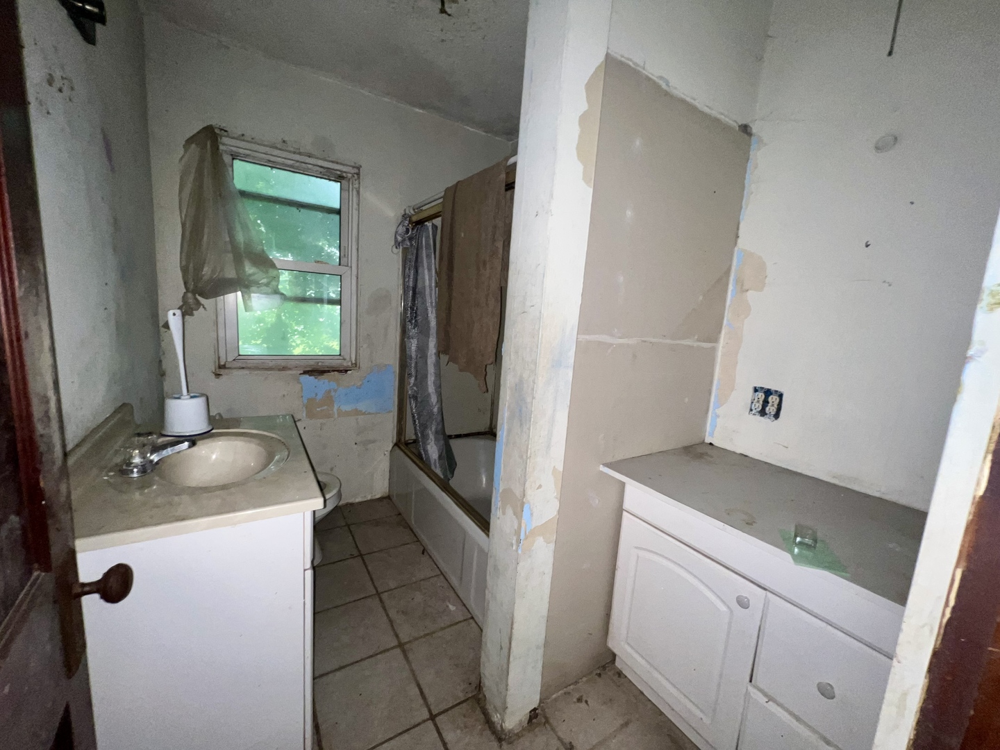 103 2nd Street Broadlands, IL 61816 - Photo 28 of 37 a bathroom with a granite countertop sink toilet and shower