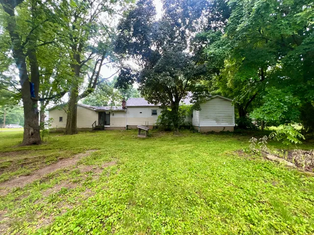 a house view with a garden space