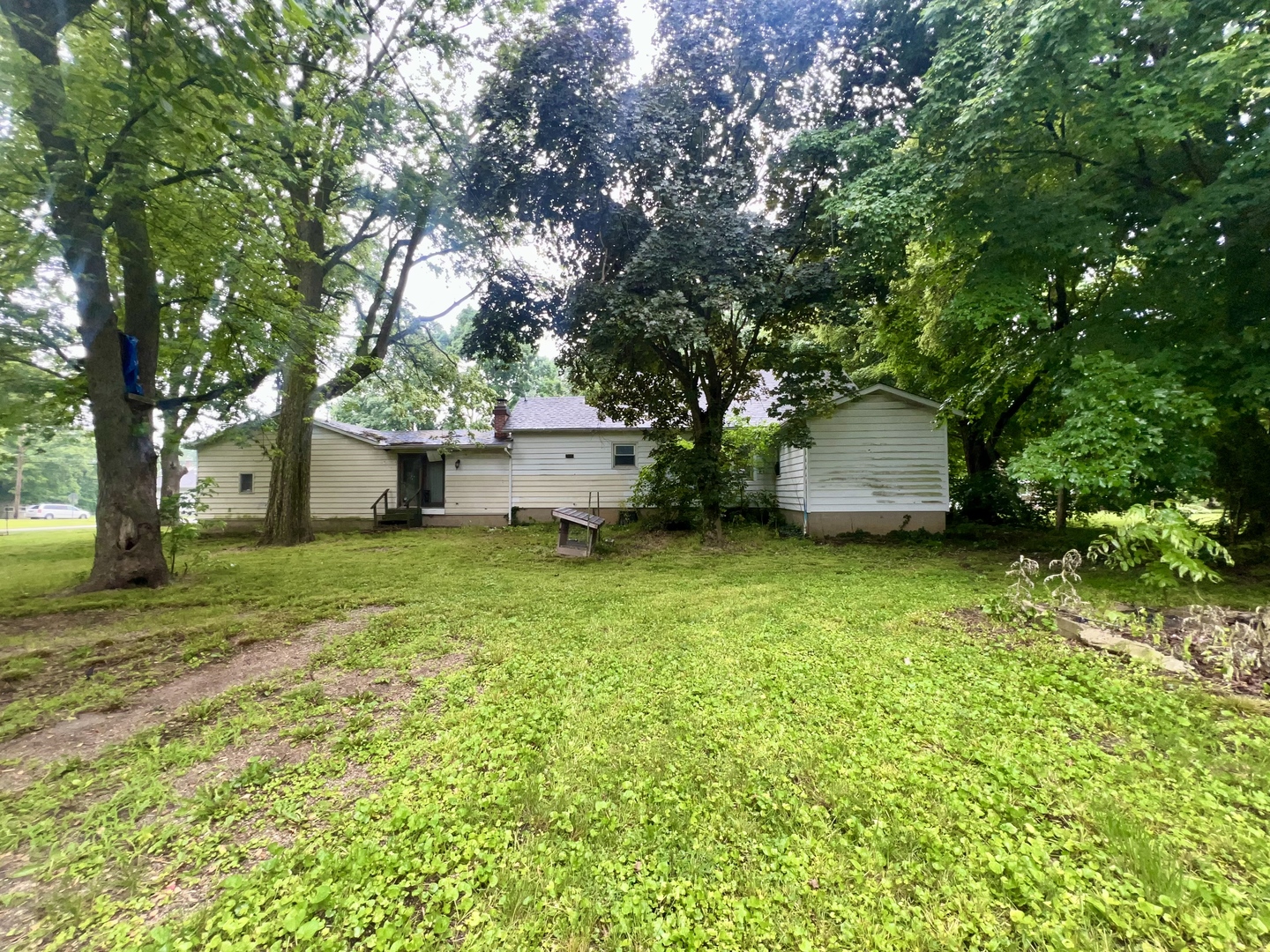 103 2nd Street Broadlands, IL 61816 - Photo 33 of 37 a house view with a garden space