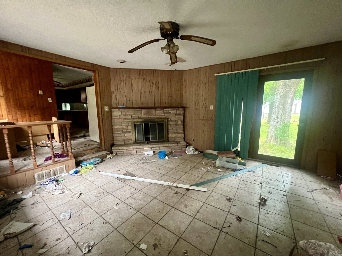 103 2nd Street Broadlands, IL 61816 - Photo 6 of 37 a living room with furniture a fireplace and a chandelier