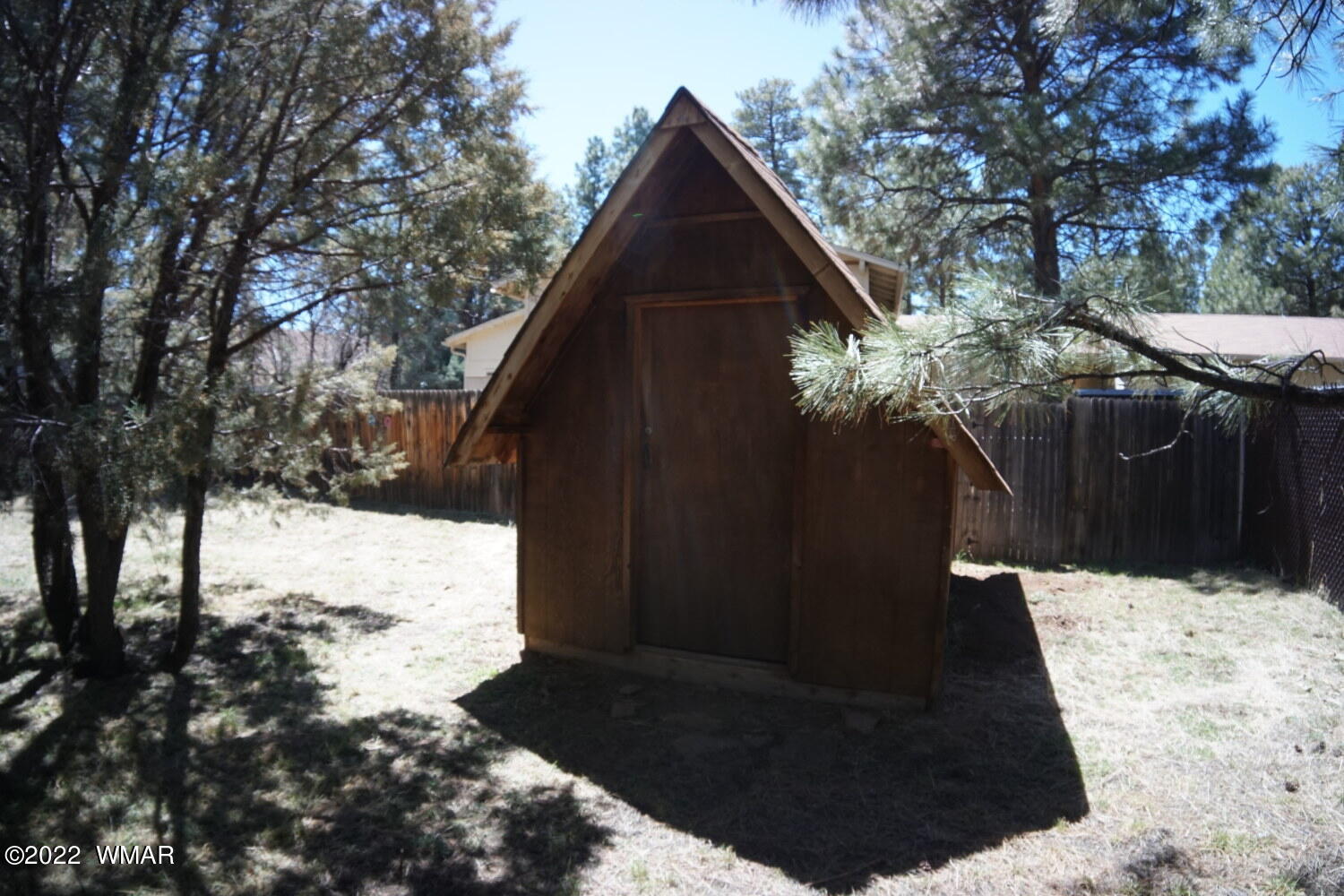 2888 Long Rifle Place Overgaard, AZ 85933 - Photo 16 of 20 a backyard of a house with lots of green space