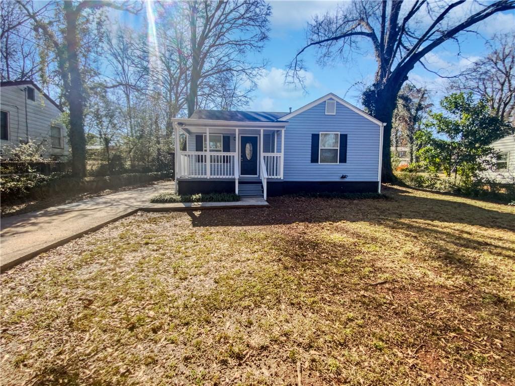 3447 Orchard Circle Decatur, GA 30032 - Photo 1 of 1 a front view of a house with a yard