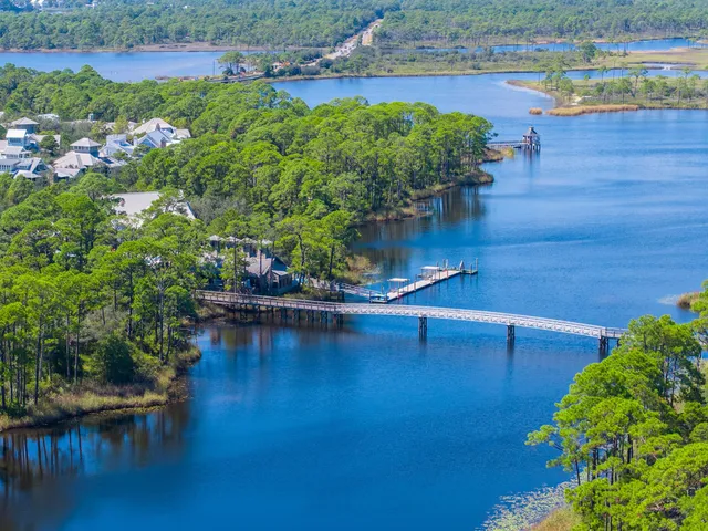 a view of a lake with a yard