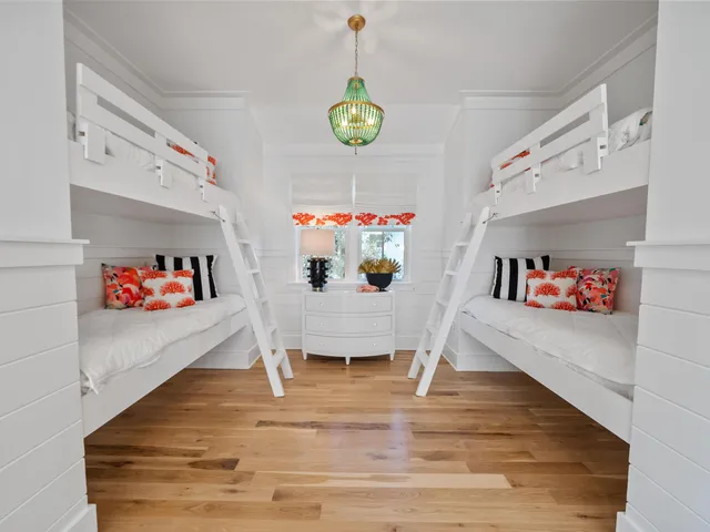 a view of play room with furniture and a chandelier
