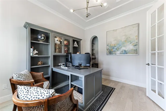 a workspace with furniture and window