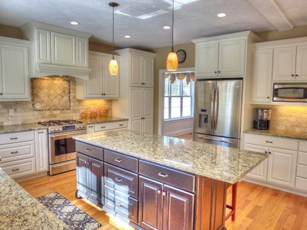 73 Front Street Hopkinton, MA 01748 - Photo 11 of 30 a kitchen with stainless steel appliances granite countertop a sink a stove and refrigerator