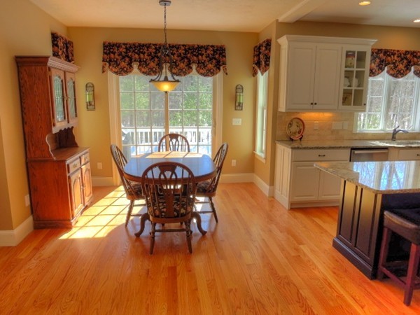 73 Front Street Hopkinton, MA 01748 - Photo 14 of 30 a dining room with furniture and wooden floor