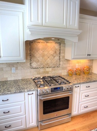 73 Front Street Hopkinton, MA 01748 - Photo 16 of 30 a kitchen with granite countertop white cabinets and appliances