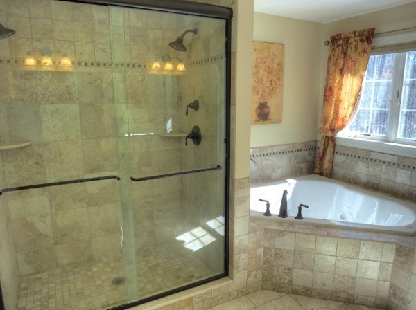 73 Front Street Hopkinton, MA 01748 - Photo 20 of 30 a bathroom with a shower and a sink