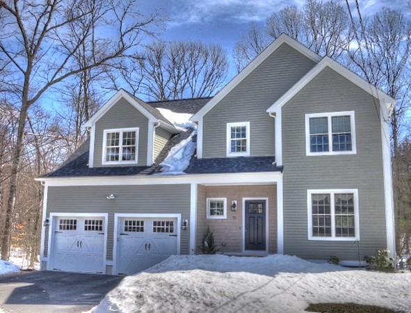 73 Front Street Hopkinton, MA 01748 - Photo 2 of 30 a front view of a house with a yard