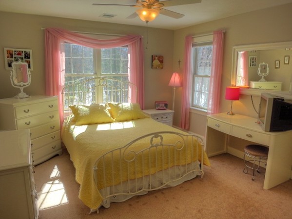 73 Front Street Hopkinton, MA 01748 - Photo 23 of 30 a bed sitting in a bedroom next to a window