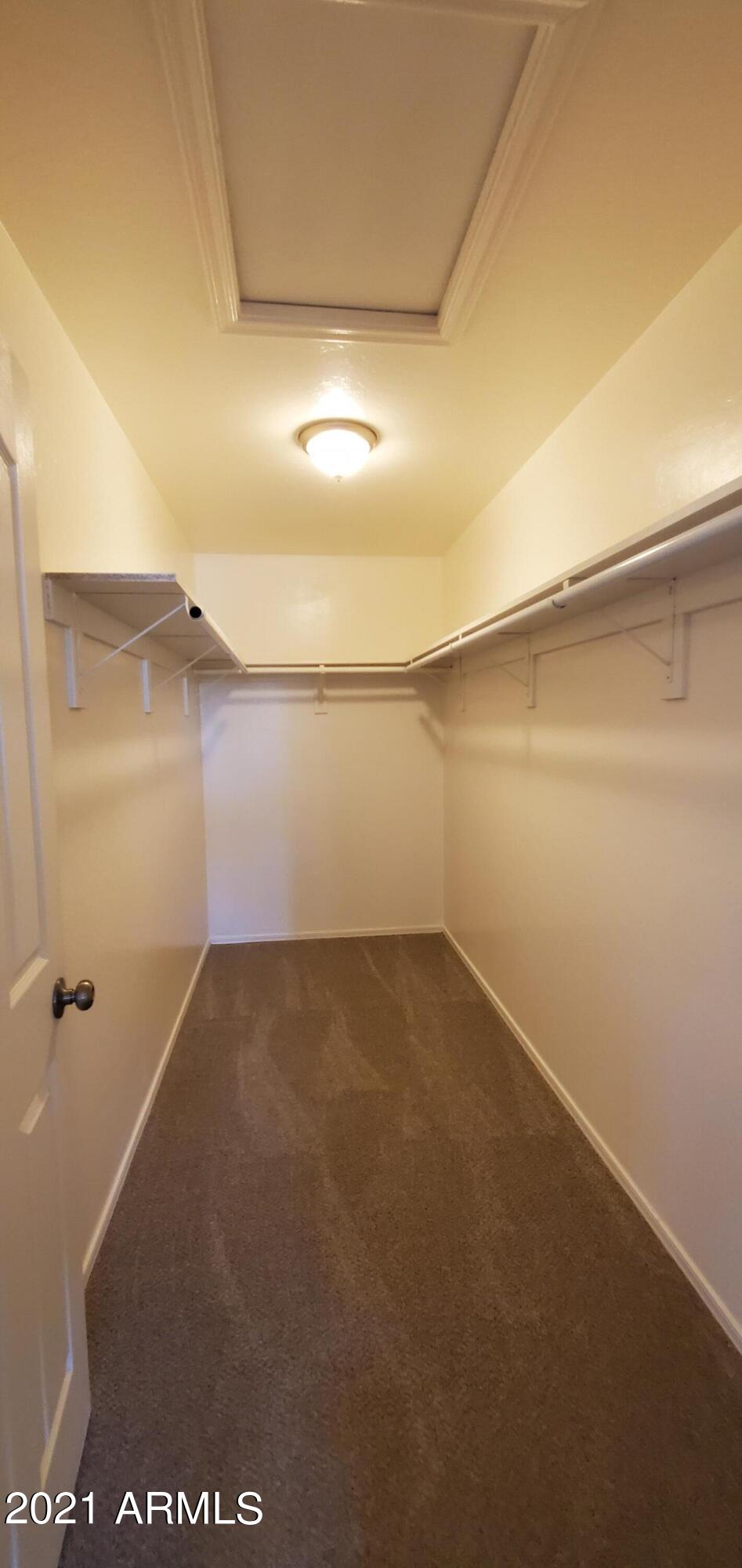 4218 West Carter Road Phoenix, AZ 85041 - Photo 17 of 26 Master walk in closet