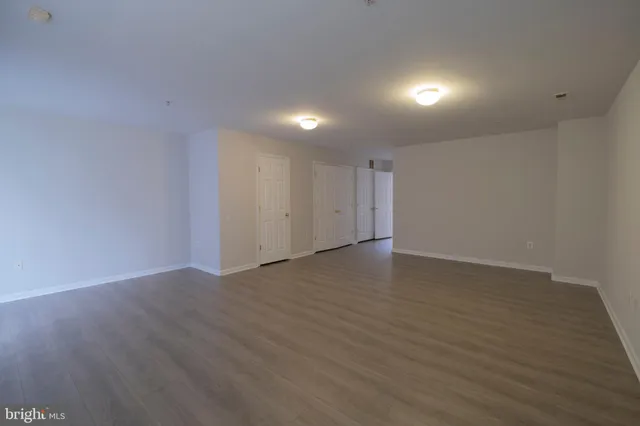 a view of house with a deck and furniture