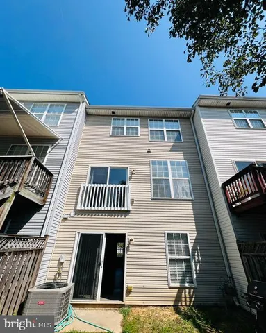 a view of a swimming pool with a table and chairs