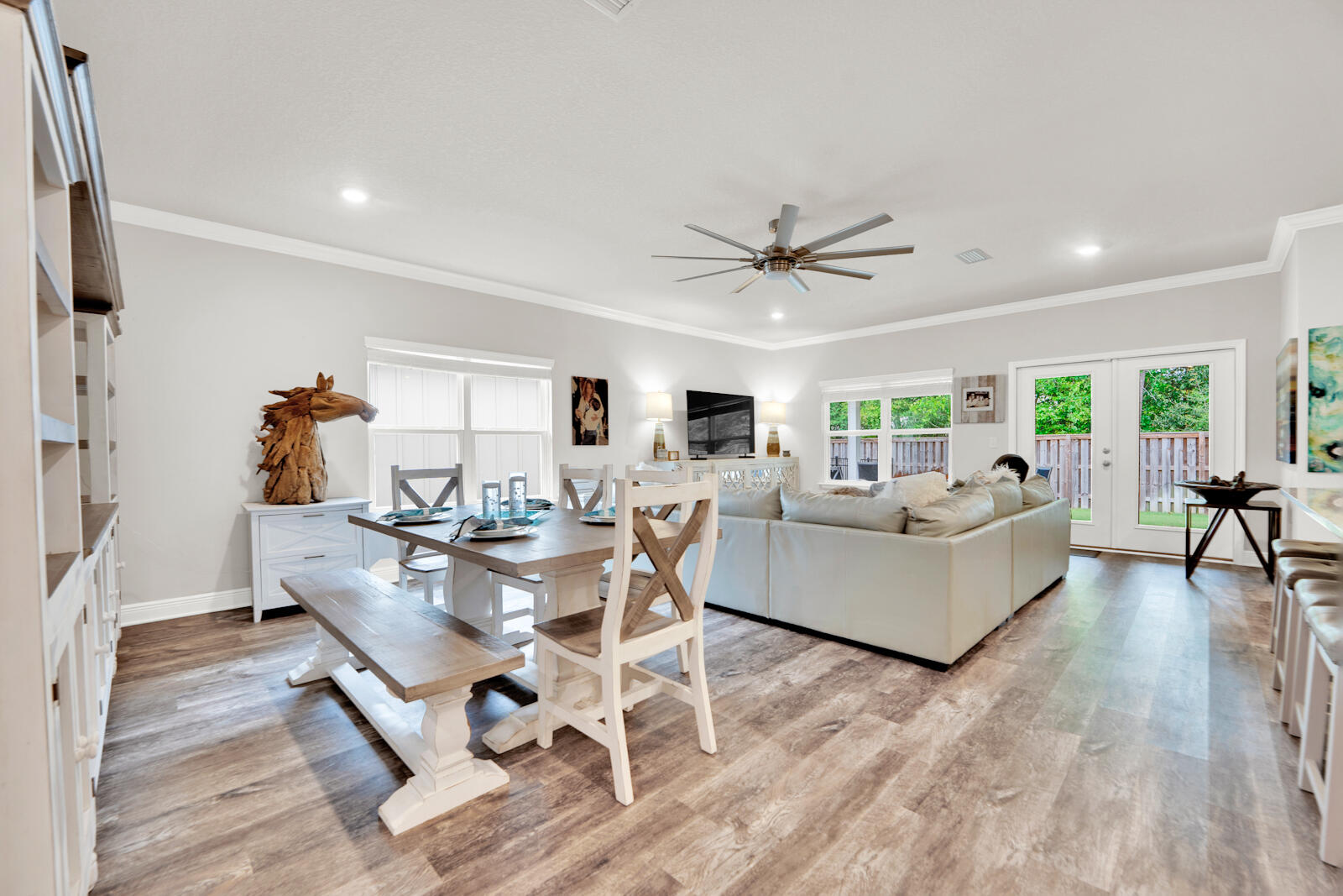 451 Lightning Bug Lane Freeport, FL 32439 - Photo 14 of 47 a living room with furniture and a wooden floor