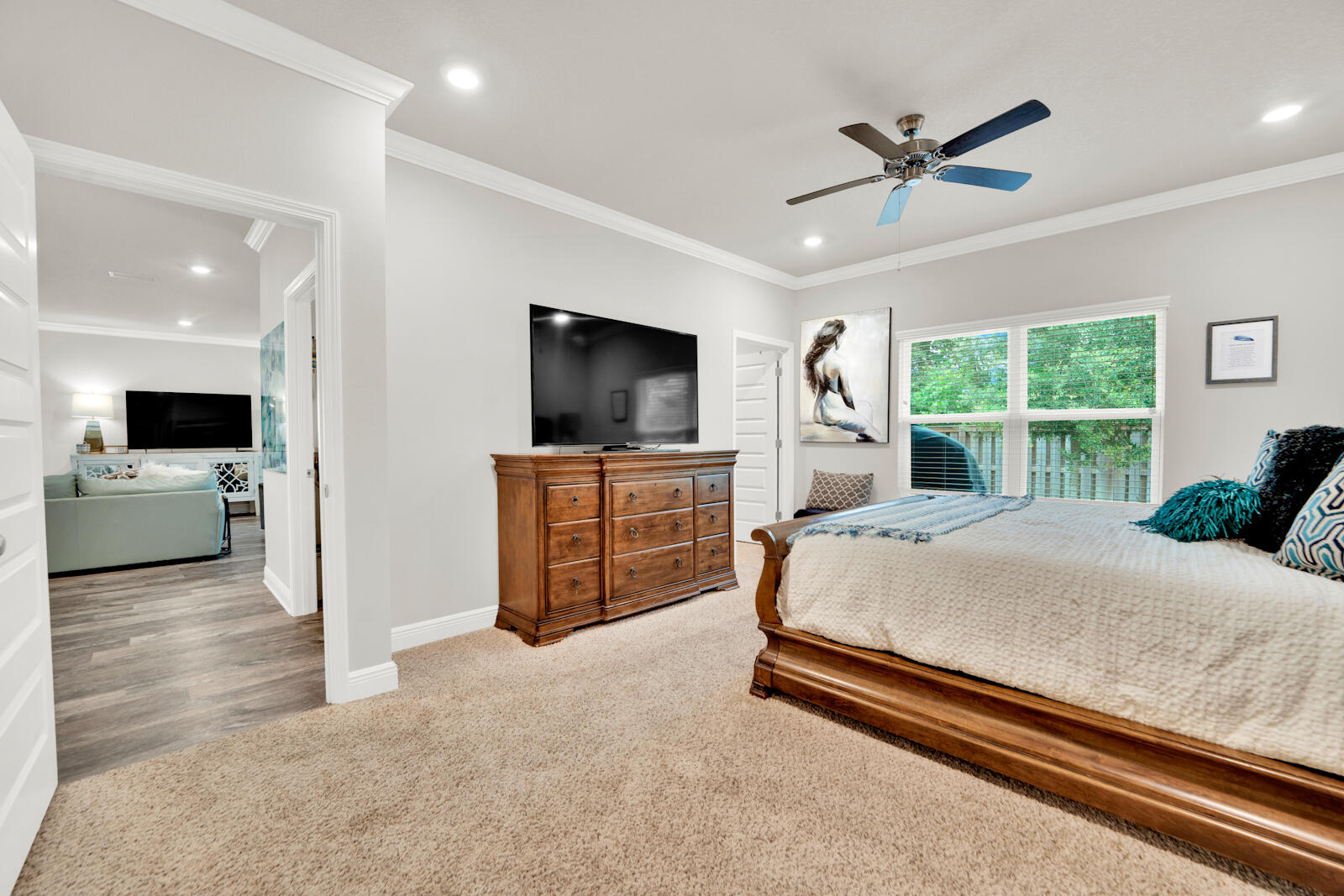 451 Lightning Bug Lane Freeport, FL 32439 - Photo 28 of 47 a bedroom with a bed and a television on desk