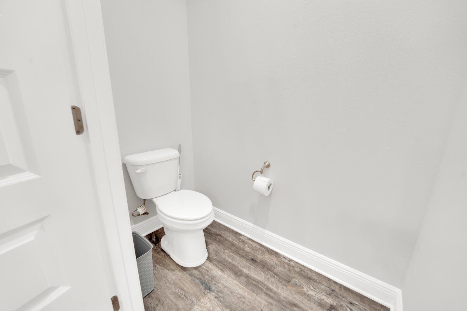 451 Lightning Bug Lane Freeport, FL 32439 - Photo 35 of 47 a white toilet sitting next to a white wall