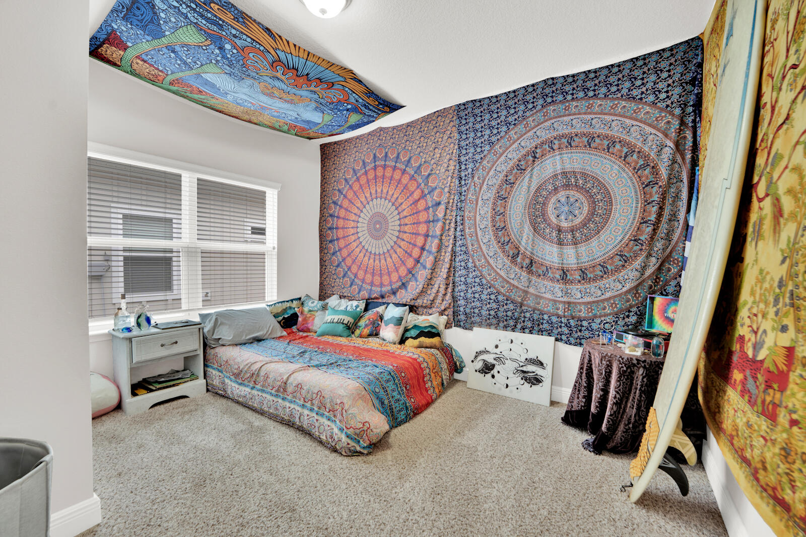 451 Lightning Bug Lane Freeport, FL 32439 - Photo 9 of 47 a bedroom with a bed and a table in it