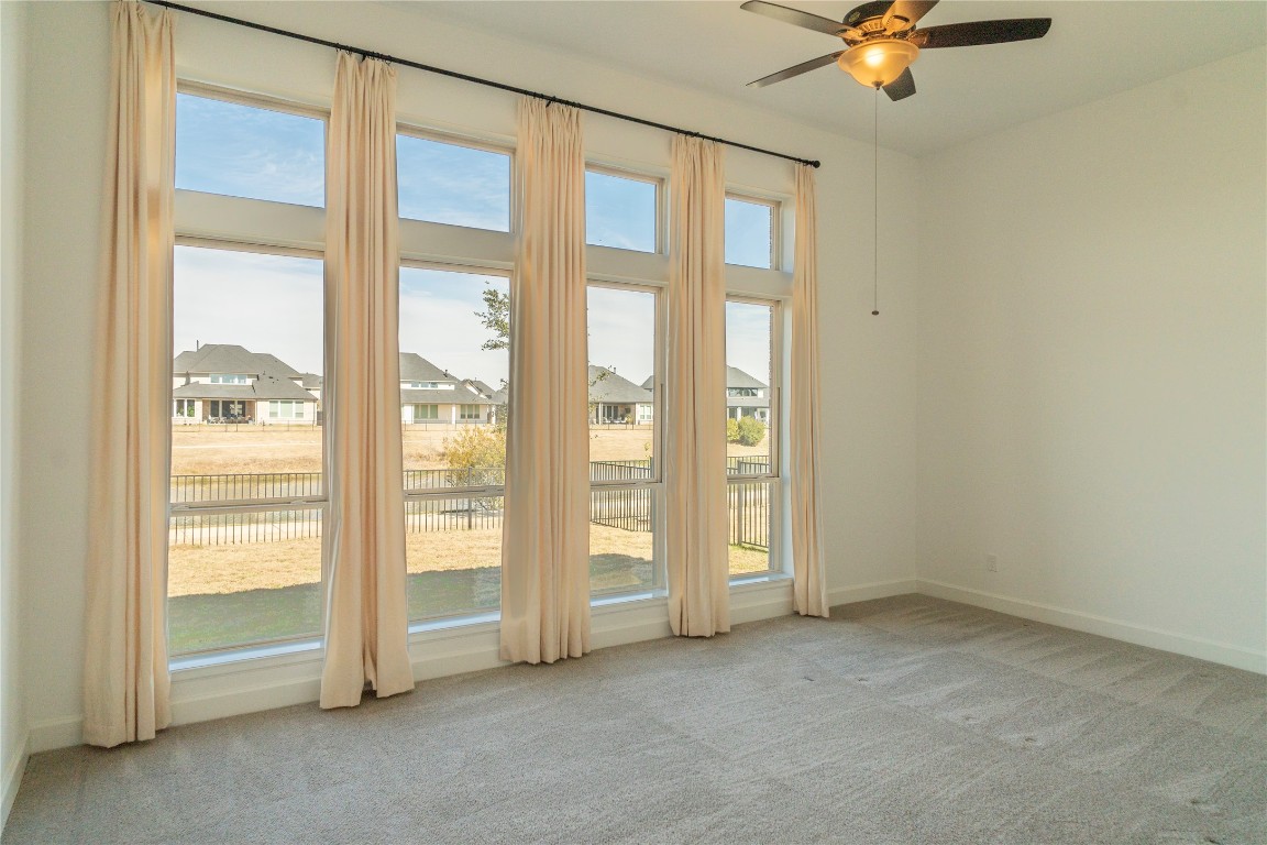 29856 Smoky Ridge Road Fulshear, TX 77441 - Photo 11 of 36 an empty room with windows