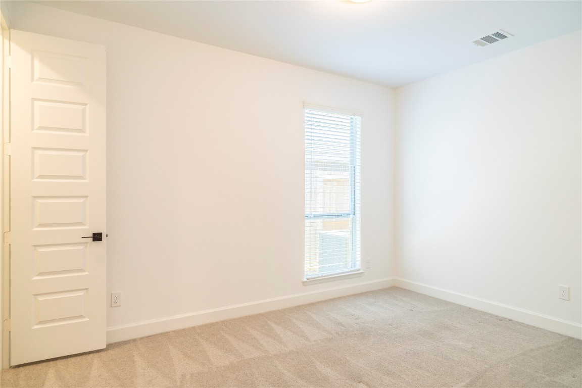 29856 Smoky Ridge Road Fulshear, TX 77441 - Photo 17 of 36 a view of an empty room