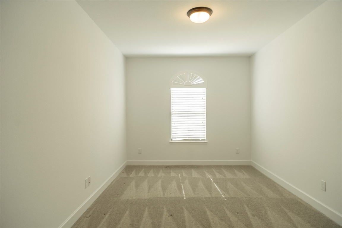 29856 Smoky Ridge Road Fulshear, TX 77441 - Photo 25 of 36 an empty room with a window