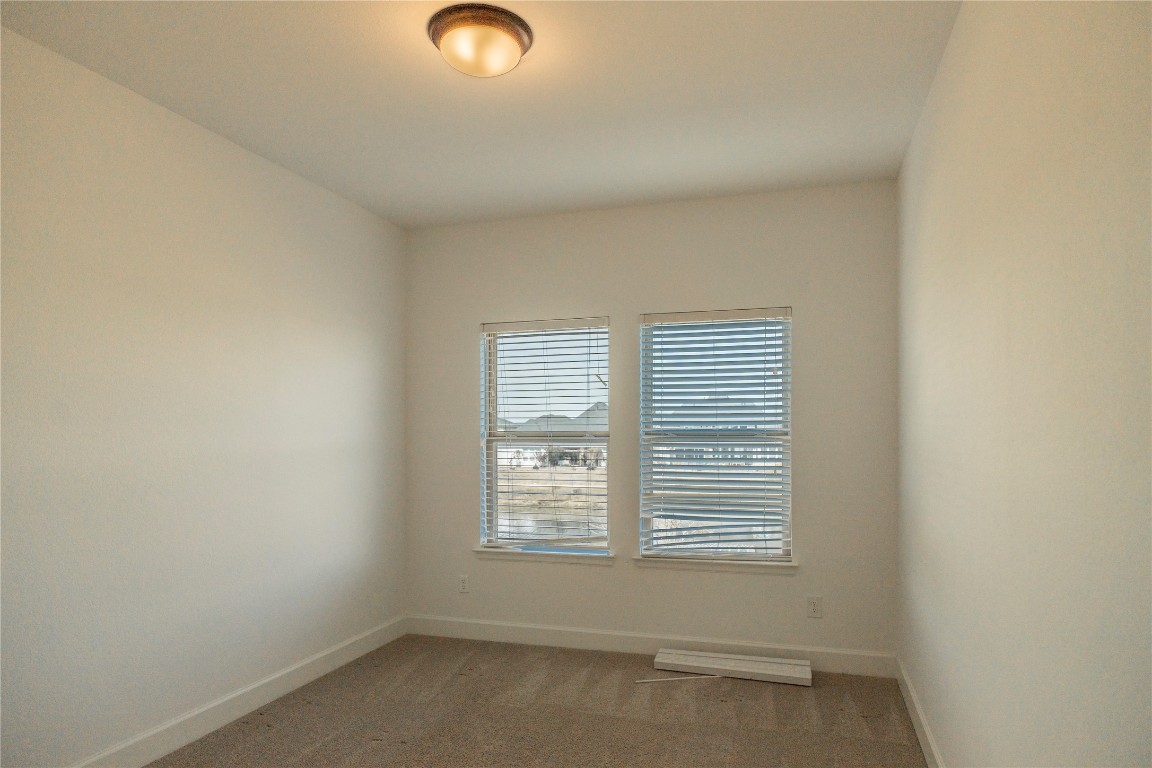 29856 Smoky Ridge Road Fulshear, TX 77441 - Photo 28 of 36 an empty room with a window
