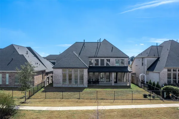 a view of a house with a swimming pool