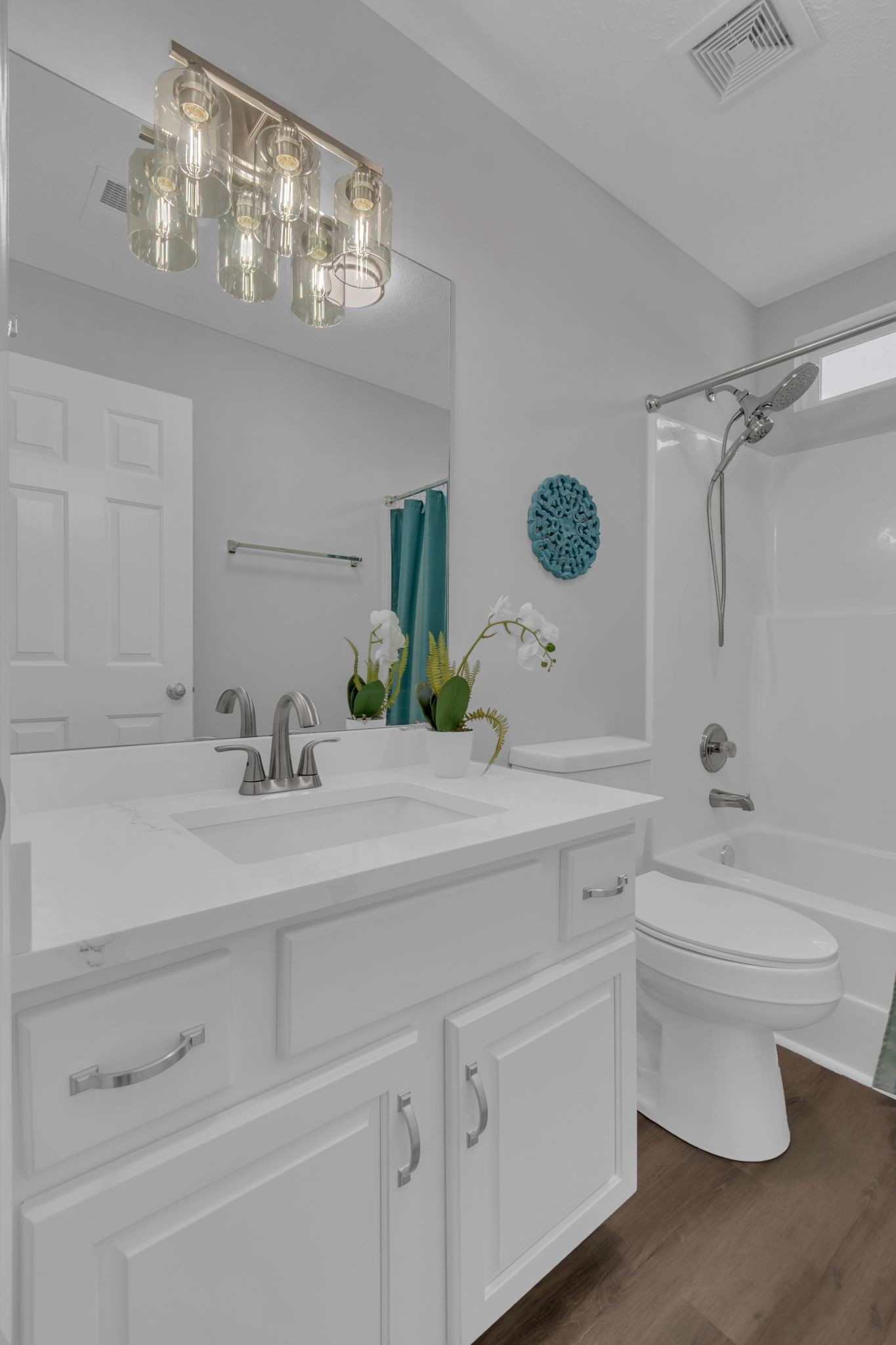 3324 Monoco Drive Spring Hill, TN 37174 - Photo 23 of 31 a bathroom with a sink vanity granite toilet and a mirror