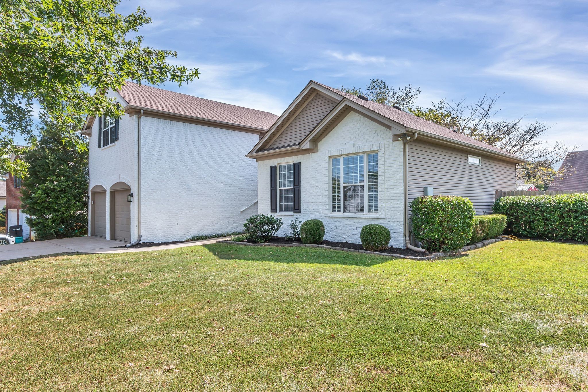 3324 Monoco Drive Spring Hill, TN 37174 - Photo 3 of 31 a view of a house with a yard and potted plants
