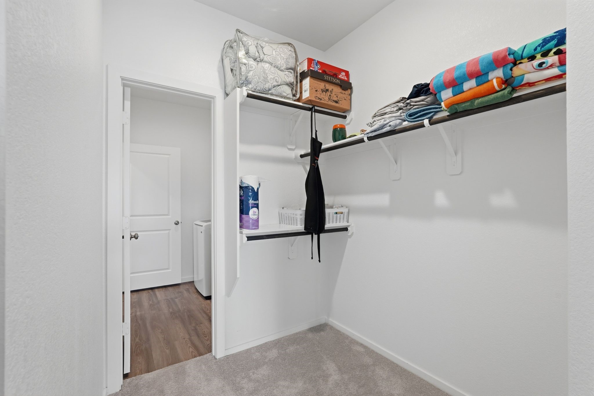 651 Spring Ashberry Court Magnolia, TX 77354 - Photo 20 of 30 Second primary closet leading into the laundry room
