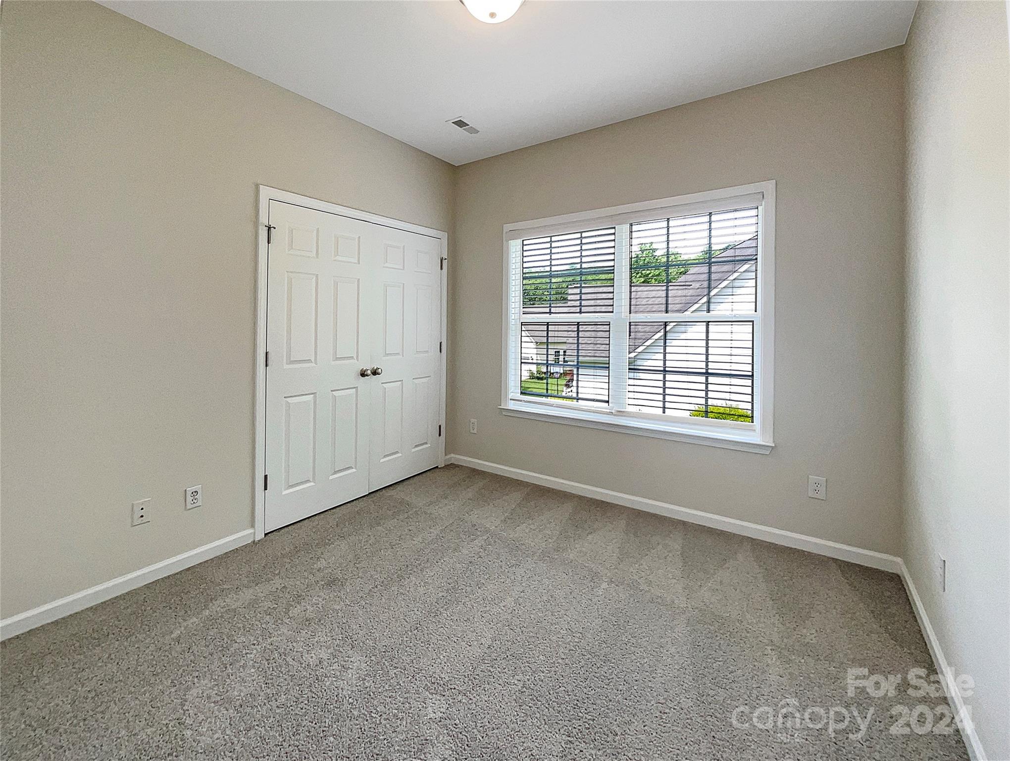 315 Lone Tree Lane Clover, SC 29710 - Photo 14 of 15 an empty room with windows