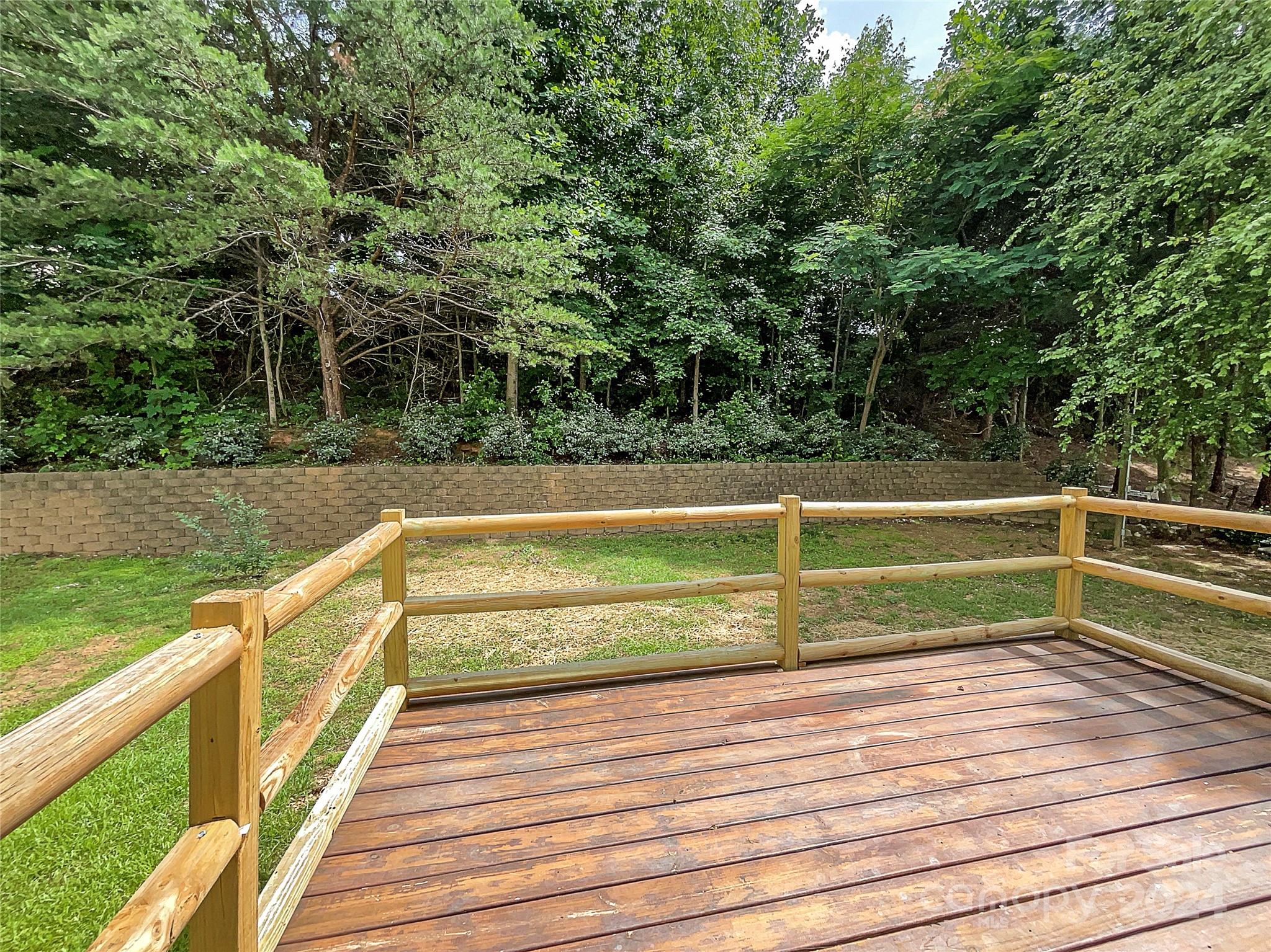 315 Lone Tree Lane Clover, SC 29710 - Photo 10 of 15 a view of deck with large trees and wooden fence