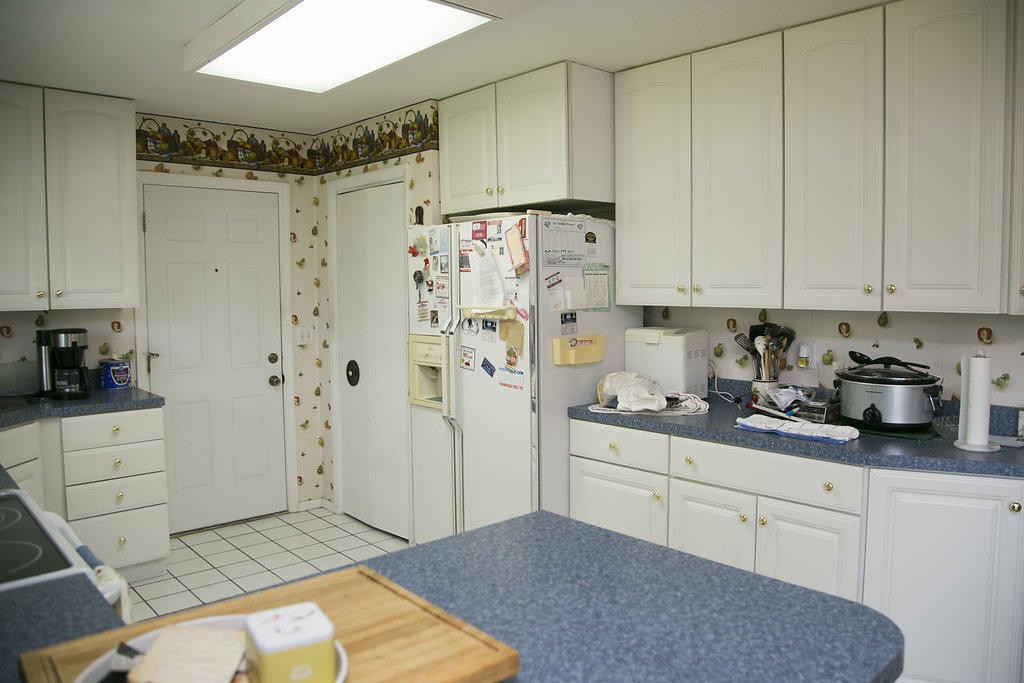4405 Royalview Road Knoxville, TN 37921 - Photo 17 of 38 a kitchen with stainless steel appliances granite countertop a refrigerator and a stove top oven