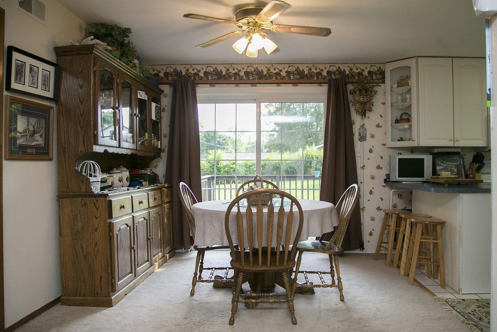 4405 Royalview Road Knoxville, TN 37921 - Photo 19 of 38 a view of a dining room with furniture window and outside view