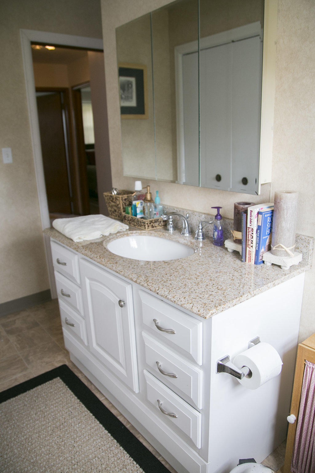 4405 Royalview Road Knoxville, TN 37921 - Photo 26 of 38 a bathroom with a granite countertop sink and a mirror